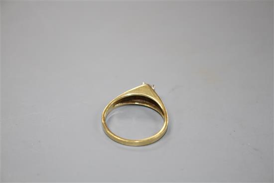 A modern 18ct gold and solitaire diamond ring,